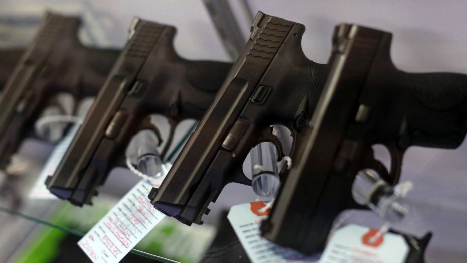 Handguns are displayed for sale at Metro Shooting Supplies in Bridgeton, Mo., Nov. 13, 2014.