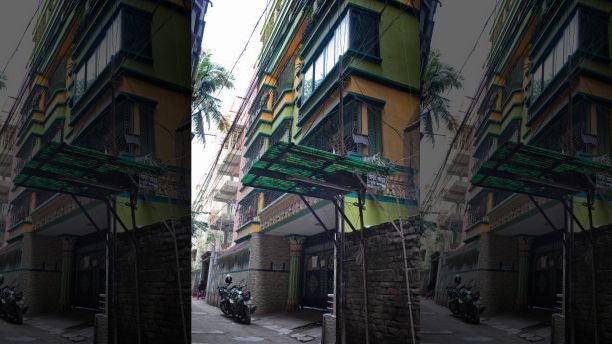A motorcycle is parked in front of a building where 27-year-old Bangladeshi man Akayed Ullah, used to live in Dhaka, Bangladesh, Tuesday, Dec. 12, 2017. Bangladesh counterterrorism officers are questioning the wife and other relatives of Ullah, who is accused of carrying out a bomb attack in New York City's subway system, officials said Tuesday. (AP Photo/A.M. Ahad)