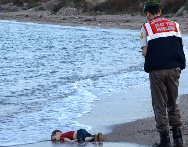 2015 photos of the year toddler Alan Kurdi body washed up Sept 2 Turkish beach
