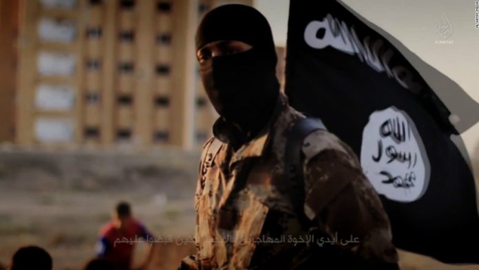 150605130930-isis-fighter-masked-recruitment-video-super-169.jpg