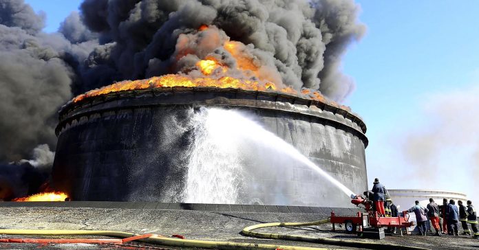 102299818-libya-oil-tank-fire.1910x1000.jpg