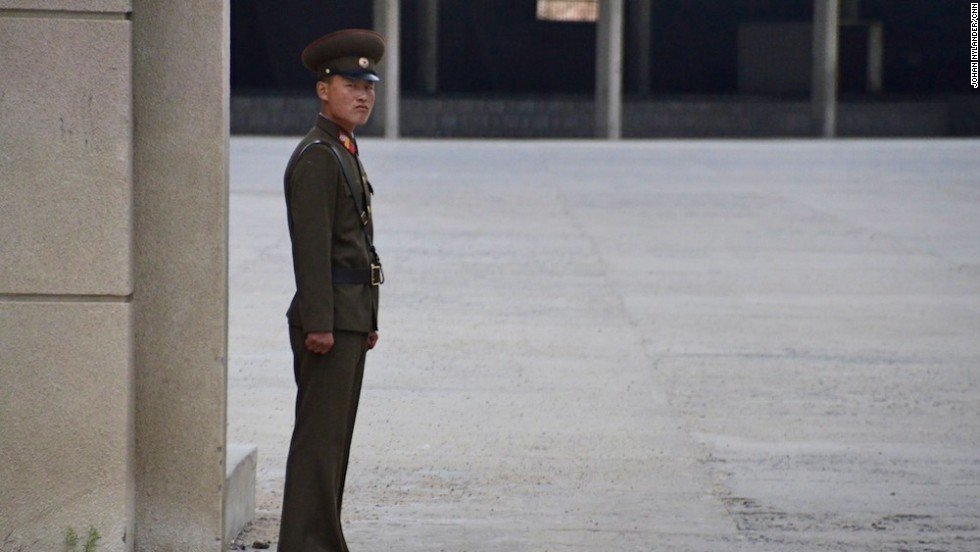 A stern looking North Korean guard by the Chinese border customs office. This image was deleted by North Korean officials.