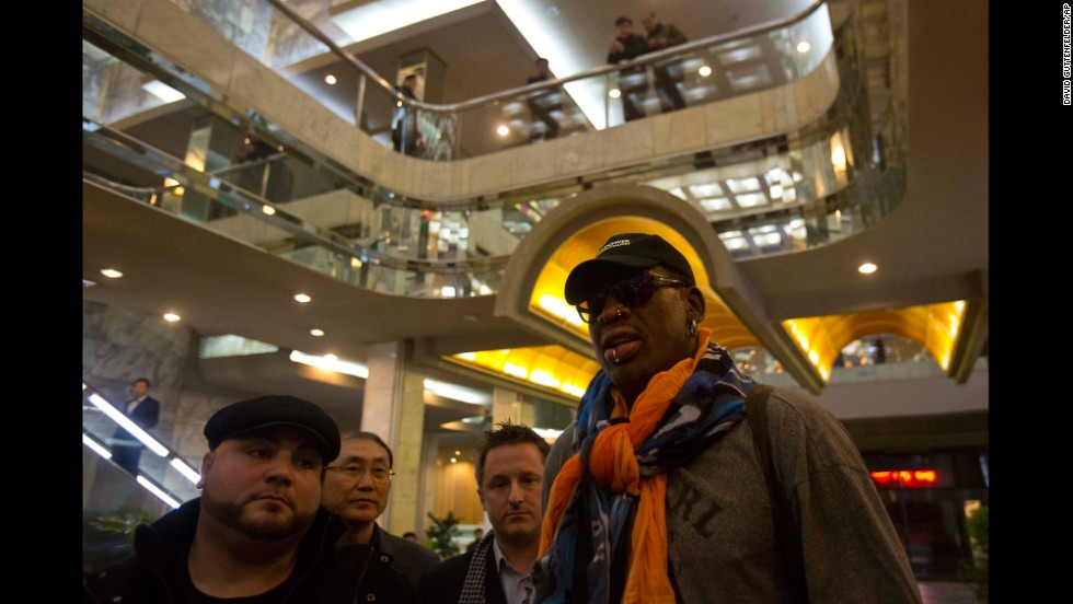 Rodman attracts notice as he enters the Koryo Hotel in Pyongyang on Thursday, December 19.