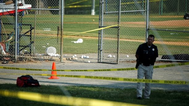 A police officer mans a shooting scene after a gunman opened fire on Republican members of Congress during a baseball practice near Washington in Alexandria, Virginia, June 14, 2017. REUTERS/Joshua Roberts - RTS171V0