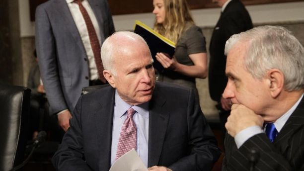 Senate Armed Services Committee Chairman Sen. John McCain, R-Ariz., left, confers with the committee's ranking member, Sen. Jack Reed, D-R.I., on Capitol Hill in Washington, Tuesday, March, 14, 2017, prior to the start of the committee's hearing on the investigation of nude photographs of female Marines and other women that were shared on the Facebook page 