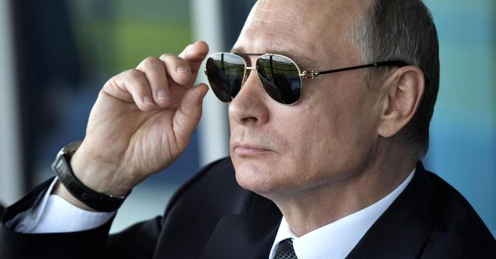 104627558-RTX3BX3P-putin.1910x1000.jpg
