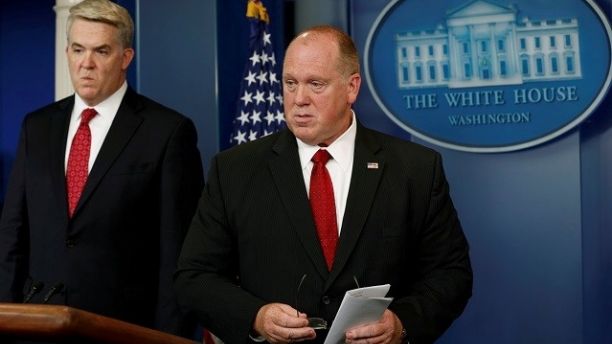 Thomas Homan (R), acting director of the Immigration and Customs Enforcement Agency (ICE), and U.S. Attorney for Utah John Huber hold a briefing at the White House in Washington, U.S., June 28, 2017. REUTERS/Yuri Gripas - RTS190OW