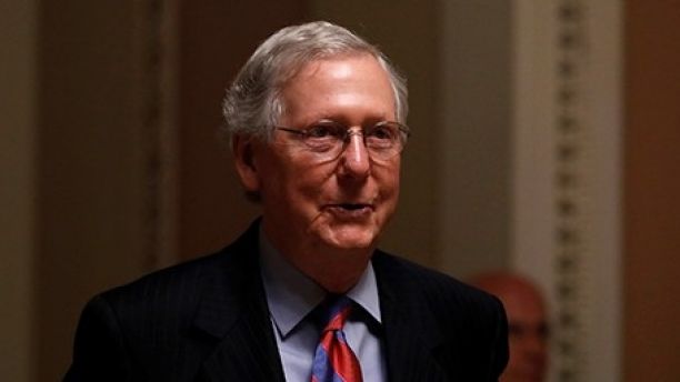 Senate Majority Leader Mitch McConnell walks to his office prior to an all night round of health care votes on Capitol Hill in Washington, U.S., July 27, 2017. REUTERS/Aaron P. Bernstein - RTX3D88E