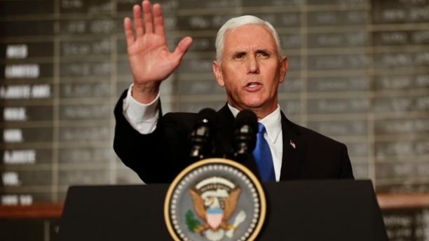 U.S. Vice President Mike Pence waves after speaking at the Buenos Aires Stock Exchange, in Argentina, Tuesday, Aug. 15, 2017. Pence is on a official visit to Argentina until Wednesday, when he will be heading to Chile on a week-long visit to Latin America. (AP Photo/Victor R. Caivano)