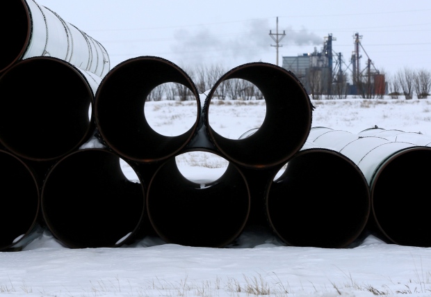 Keystone XL pipeline pipes smiling
