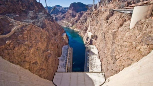 From the center of Hoover Dam at the Nevada-Arizona border, this view shows the Colorado River and the new bypass bridge that is under construction.