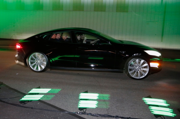 TESLA MOTORS-LAUNCH/