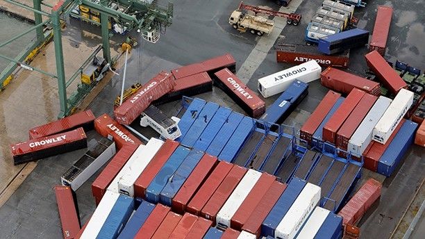 Shipping containers strewn around the main port are seen from a Marine Corps MV-22 Osprey surveying damage from Hurricane Maria in St. Croix, , U.S. Virgin Islands, September 21, 2017.  REUTERS/Jonathan Drake - RC1593A0CDD0