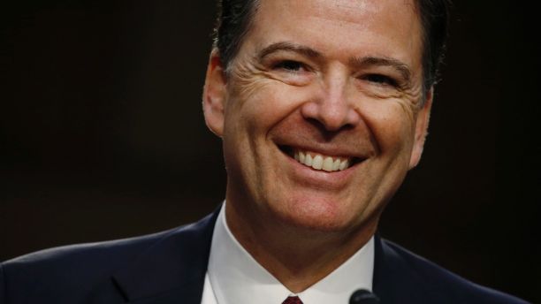 Former FBI Director James Comey testifies before a Senate Intelligence Committee hearing on 