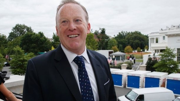 In this Aug. 11, 2017 file photo, former White House press secretary Sean Spicer walks up the steps of the Eisenhower Executive Office Building adjacent to the White House in Washington. Spicer finally got to meet the Pope. Vatican spokesman Greg Burke confirms the former White House press secretary attended a meeting with Pope Francis on Sunday, Aug. 27, 2017. (AP Photo/J. Scott Applewhite)
