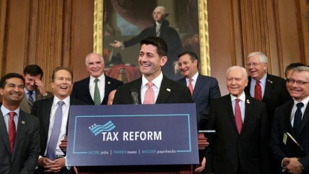 Speaker of the House Paul Ryan, R-Wis., smiles as he talks about the Republicans' proposed rewrite of the tax code for individuals and corporations, at the Capitol in Washington, Wednesday, Sept. 27, 2017. President Donald Trump and congressional Republicans are writing a far-reaching, $5-trillion plan they say would simplify the tax system and nearly double the standard deduction used by most Americans. (AP Photo/J. Scott Applewhite)
