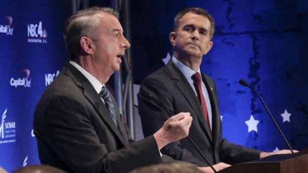 CORRECTS LOCATION TO MCLEAN, VIRGINIA Gubernatorial candidates Republican Ed Gillespie, left, and Democrat Lt. Gov. Ralph Northam debate in McLean, Va., Tuesday, Sept. 19, 2017. The two major party candidates in Virginia's closely watched race for governor argued in mostly cordial tones Tuesday over taxes, President Donald Trump and what Virginia should do with its numerous monuments to the Confederacy. (Bonnie Jo Mount/The Washington Post via AP, Pool)