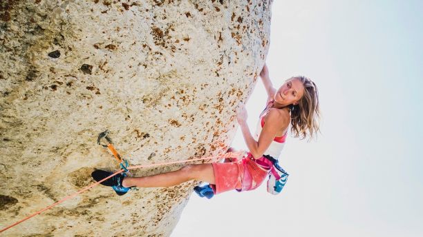 In this undated photo provided by Louis Arevalo, Inge Perkins climbs Cowboy King (5.13c) in Wild Iris, Wyo. Gallatin County sheriff's officials say Perkins was skiing with her boyfriend Hayden Kennedy on Imp Peak on Saturday, Oct. 7, 2017, when they triggered an avalanche in a steep, narrow gulley. Perkins, was buried by the 150-foot-wide slide. Kennedy, who was partially buried, pulled himself free and hiked out for help after he couldn't find his girlfriend. (Louis Arevalo via AP)