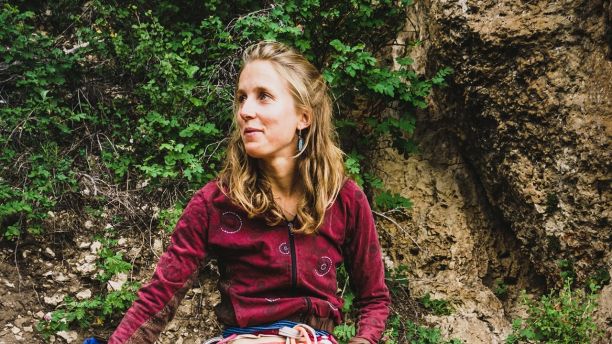In this undated photo provided by Louis Arevalo, Inge Perkins puts on her shoes before casting off on Cowboy King in Wild Iris, Wyo. Gallatin County sheriff's officials say Perkins was skiing with her boyfriend Hayden Kennedy on Imp Peak on Saturday, Oct. 7, 2017, when they triggered an avalanche in a steep, narrow gulley. Perkins, was buried by the 150-foot-wide slide. Kennedy, who was partially buried, pulled himself free and hiked out for help after he couldn't find his girlfriend. (Louis Arevalo via AP)