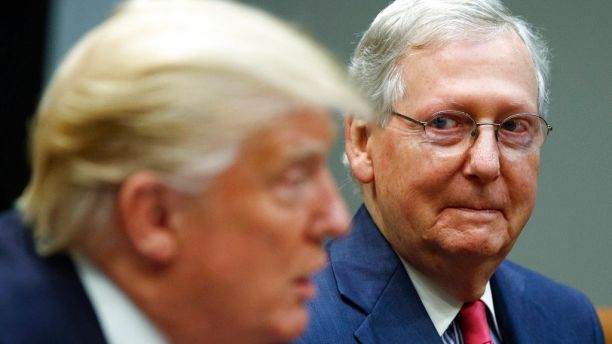 FILE - In this Sept. 5, 2017, file photo, Senate Majority Leader Mitch McConnell, R-Ky., right, listens as President Donald Trump speaks during a meeting with Congressional leaders and administration officials in the Roosevelt Room of the White House in Washington. Trump and McConnell are scheduled to meet Monday, Oct. 16. (AP Photo/Evan Vucci, File)