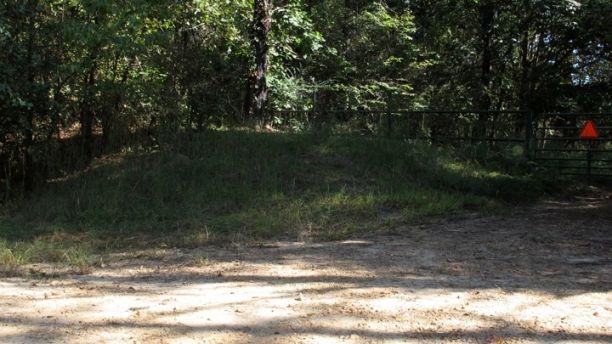 This Tuesday, Oct. 3, 2017 photo shows the spot where burn victim Jessica Chambers was found in December 2014 in Courtland, Miss.  More than three years after her shocking death, Quinton Tellis is set to go on trial, charged with murder. Jury selection is to begin Monday, Oct. 9. He has pleaded not guilty. (AP Photo/Adrian Sainz)