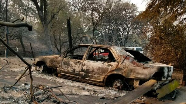 This Monday, Oct. 9, 2017, photo provided by Christine Tye shows the damage to her Gingerbread Farms property in Sonoma, Calif. Tye lost her Sonoma home early Monday, as flames ripped through her neighborhood. It was 2:30 a.m. when she awoke and realized her house was completely surrounded by flames.  (Christine Tye/Gingerbred Farms via AP)