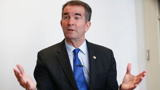 Democratic gubernatorial candidate, Lt. Gov. Ralph Northam, gestures during an interview in Richmond, Va., Monday, Sept. 18, 2017. (AP Photo/Steve Helber)