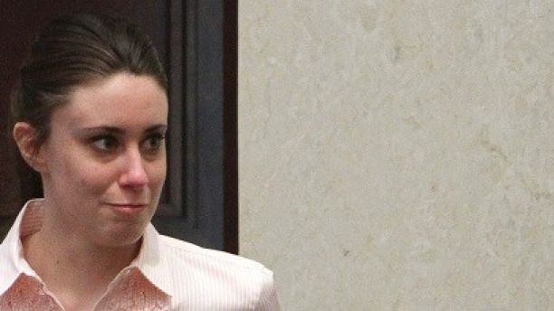 Casey Anthony smiles as she returns to the defense table after being acquitted on first degree murder charges of her daughter Caylee  at the Orange County Courthouse Orlando, Florida July 5, 2011.    REUTERS/Red Huber/Pool  (UNITED STATES - Tags: CRIME LAW) - GM1E7760DII01