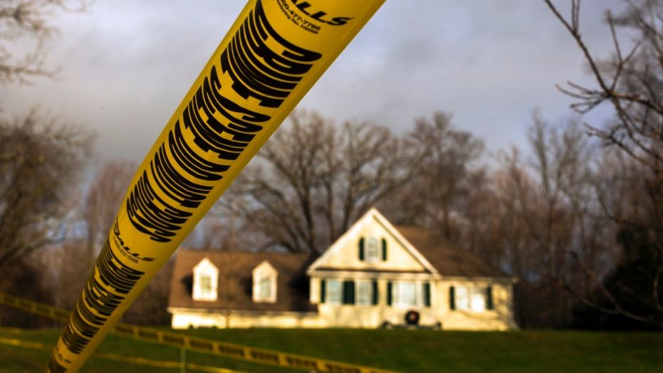 Crime scene tape outside Nancy Lanza's Sandy Hook Village home in Newtown, Conn. in 2012.