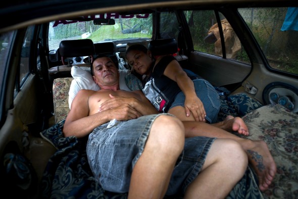 Hurricane Maria - Puerto Rican residents sleep in vehicle 