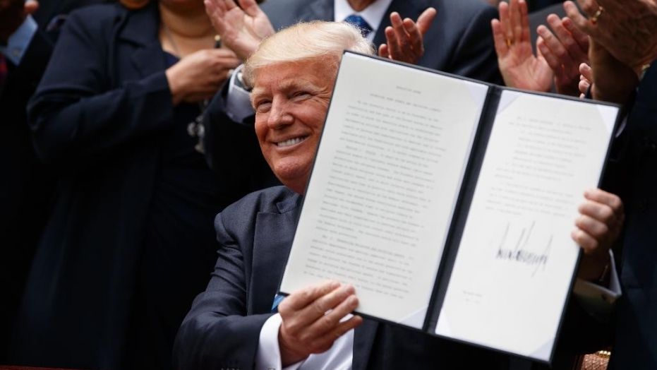 President Donald Trump plans to halt ObamaCare subsidies, a report says. Trump is pictured after signing an unrelated executive order, May 4, 2017.