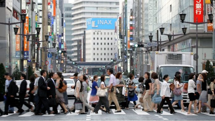 150309103016-japan-workers-780x439.jpg