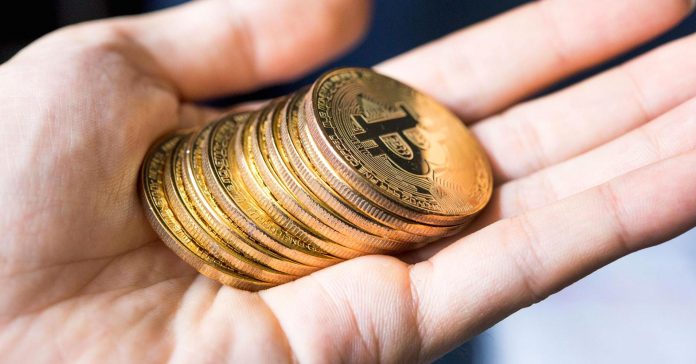 104844369-GettyImages-872408804-bitcoin.1910x1000.jpg