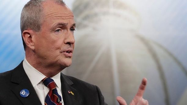 FILE- In this May 11, 2017, file photo, Phil Murphy participates in a Democratic gubernatorial primary debate in Newark, N.J. New Jersey voters are heading to the polls to pick their candidates to succeed Republican Gov. Chris Christie on Tuesday, June 6. (AP Photo/Julio Cortez, File)