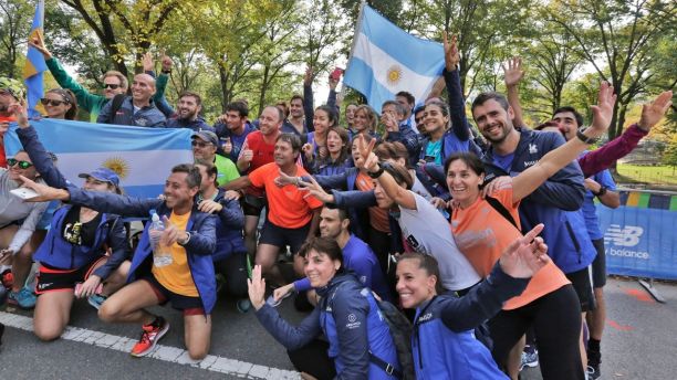 A group of runners from Argentina pose for photos with their country's flag, near the finish of the New York City Marathon, in New York's Central Park, Friday, Nov. 3, 2017. New York City police say they're prepared with increased security for the marathon this weekend, days after eight people were killed not far from the World Trade Center in a terrorist attack when a man driving a rented truck mowed people down on a bicycle path. (AP Photo/Richard Drew)
