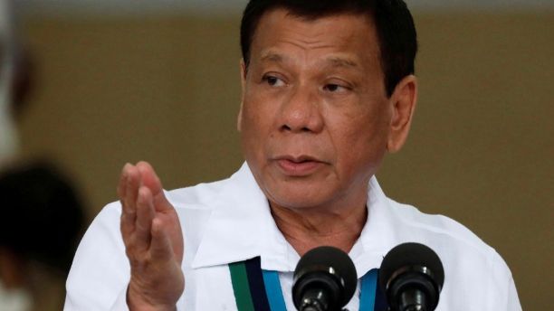 Philippines President Rodrigo Duterte gestures during Change of Command ceremonies of the Armed Forces of the Philippines (AFP) at Camp Aguinaldo in Quezon City, metro Manila, Philippines October 26, 2017. REUTERS/Dondi Tawatao - RC18577266D0
