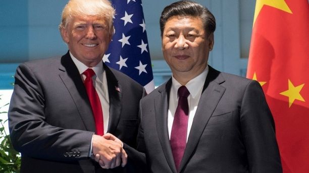 U.S. President Donald Trump and Chinese President Xi Jinping (R) shake hands prior to a meeting on the sidelines of the G20 Summit in Hamburg, Germany, July 8, 2017. REUTERS/Saul Loeb, Pool - RC14983393A0