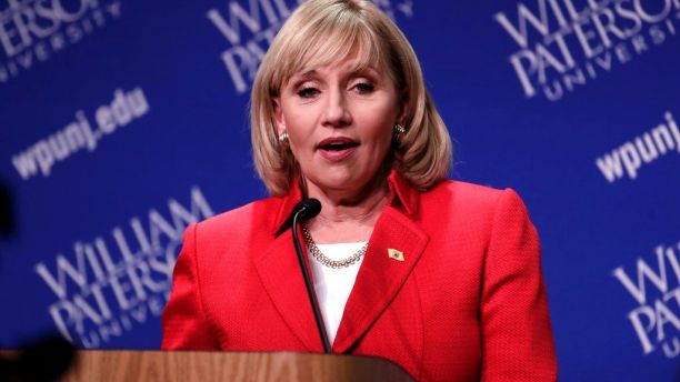 Republican nominee Lt. Gov. Kim Guadagno talks to reporters after participating in a gubernatorial debate against Democratic nominee Phil Murphy at William Paterson University, Wednesday, Oct. 18, 2017, in Wayne, N.J. (AP Photo/Julio Cortez)