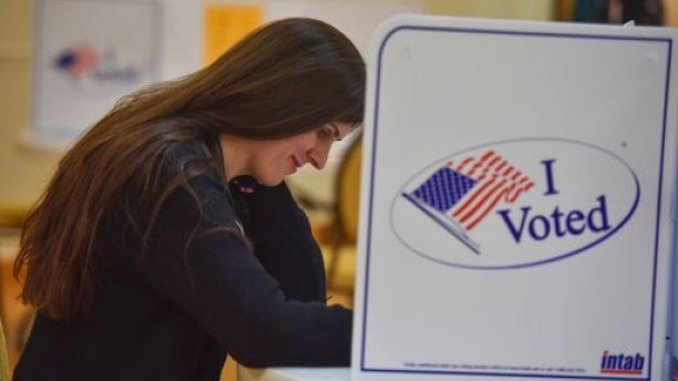 Danica Roem, who is running for house of delegates against GOP incumbent Robert Marshall, casts her vote at Buckhall Volunteer Fire Department on Tuesday, Nov. 7, 2017, in Manassas, Va. If Roem wins, she would be the first transgender legislator elected in the USA. (Jahi Chikwendiu/The Washington Post via AP)