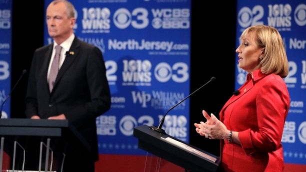 Republican nominee Lt. Gov. Kim Guadagno, right, answers a question during a gubernatorial debate against Democratic nominee Phil Murphy at William Paterson University, Wednesday, Oct. 18, 2017, in Wayne, N.J. (AP Photo/Julio Cortez, pool)
