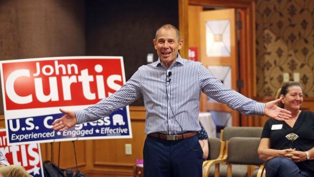 FILE - In this Tuesday, Aug. 8, 2017, file photo, Provo Mayor John Curtis speaks during town hall meeting, in Lehi, Utah. Utah voters are set to choose a replacement for U.S. Rep. Jason Chaffetz during a special election Tuesday made necessary after the Republican's surprise resignation earlier this year. Curtis, the Republican mayor of the Mormon stronghold of Provo, is expected to sail to victory in a congressional district where Republicans outnumber Democrats 5-to-1. (AP Photo/Rick Bowmer, File)