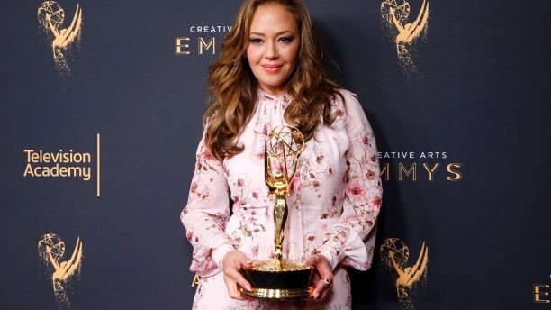 Leah Remini holds her Emmy Award for Outstanding Informational Series Or Special for 