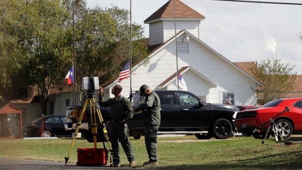 Law enforcement officials continue to investigate the scene of a shooting at the First Baptist Church of Sutherland Springs, Tuesday, Nov. 7, 2017, in Sutherland Springs, Texas. A man opened fire inside the church in the small South Texas community on Sunday, killing more than two dozen and injuring others. (AP Photo/Eric Gay)