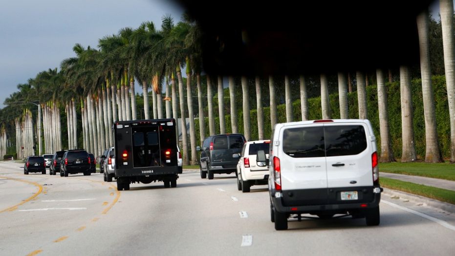 President Trump's motorcade arrives at the Trump International Golf Club in West Palm Beach, Fla. Saturday afternoon.
