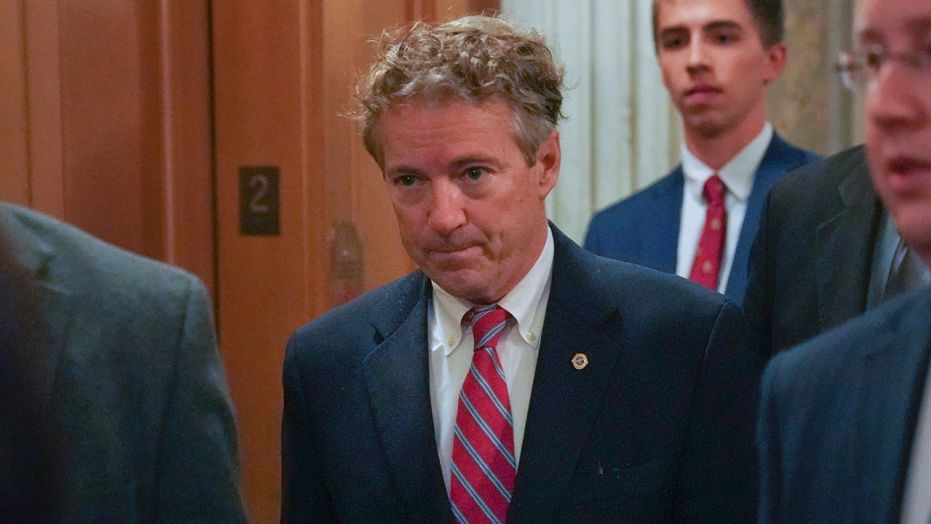 Sen. Rand Paul, R-Ky., arrives on Capitol Hill in Washington, Monday, Nov. 13, 2017. Paul entered the chamber, hands by his sides, to cast a vote.