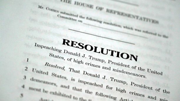 Articles of impeachment being filed against President Donald Trump are seen on Capitol Hill in Washington, U.S., November 15, 2017. REUTERS/Aaron P. Bernstein - RC15587A94E0