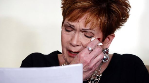 Beverly Young Nelson, the latest accuser of Alabama Republican Roy Moore, reads her statement at a news conference, in New York, Monday, Nov. 13, 2017. Nelson says Moore assaulted her when she was 16 and he offered her a ride home from a restaurant where she worked. Moore says the latest allegations against him are a 