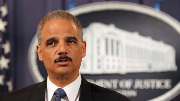 Attorney General Eric Holder speaks during a news conference at the Justice Department in Washington, Tuesday, Oct. 11, 2011. Holder announced that two individuals have been charged in New York for their alleged participation in a plot directed by elements of the Iranian government to murder the Saudi Ambassador to the United States with explosives while the ambassador was in the United States. (AP Photo/Haraz N. Ghanbari)