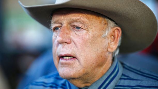 FILE - In this April 11, 2015, file photo, Nevada rancher Cliven Bundy speaks with supporters at an event in Bunkerville, Nev. A lead investigator looking into how the U.S. Bureau of Land Management handled an armed standoff with the Bundy family and supporters in Nevada is alleging misconduct in an 18-page memo that has surfaced during a trial on federal charges. (AP Photo/John Locher, File)