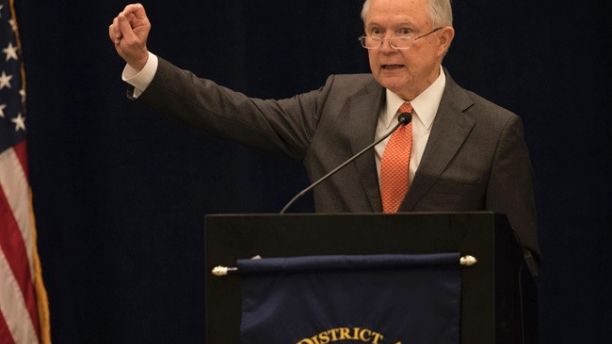 Attorney General Jeff Sessions addresses the summer meeting of the nation's district attorneys from around the country at the Hilton in Minneapolis, Minn., Monday, July, 17 2017. Sessions said the Justice Department will soon make it easier for local law enforcement to seize cash and property from crime suspects and reap the proceeds. (Jerry Holt/Star Tribune via AP)